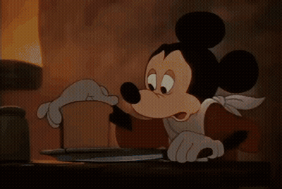 Donald Duck Sitting At Table With Food GIF