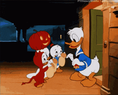 Donald Duck Trick Or Treating With Pumpkin On Head GIF