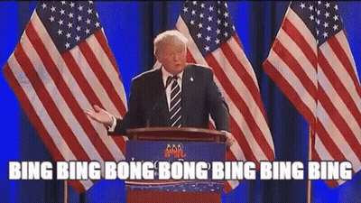 Donald Trump Is Giving A Speech At A Podium In Front Of American Flags GIF