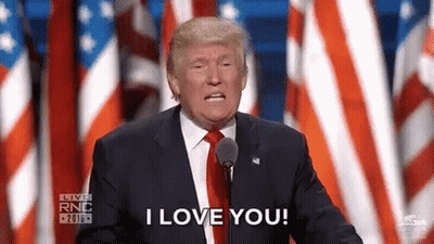 Donald Trump Is Giving A Speech In Front Of An American Flag And Saying `` I Love You '' . GIF