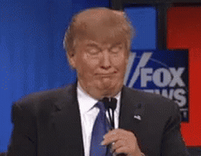 Donald Trump Making Funny Face Holding Microphone In Front Of Fox News Sign GIF