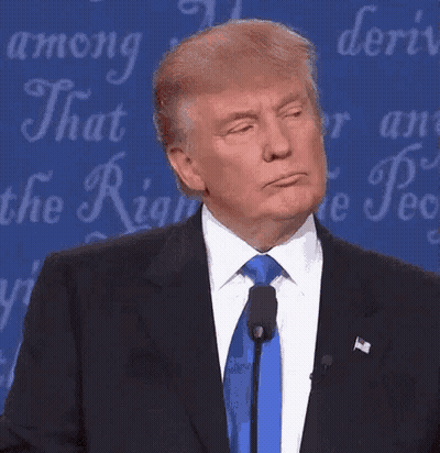 Donald Trump Making Funny Face Into Microphone GIF