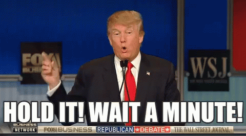 Donald Trump Says Hold It Wait A Minute In Front Of A Fox Business Republican Debate Sign GIF