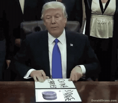 Donald Trump Sitting At Table With DonaldDraws.com Sign GIF