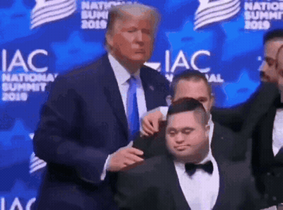 Donald Trump Standing Next To Man With Down Syndrome GIF