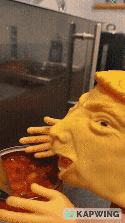 Donald Trump Statue Eating Soup GIF