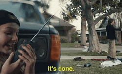 Done And Done Woman Hiding Behind Car Holding Radio GIF