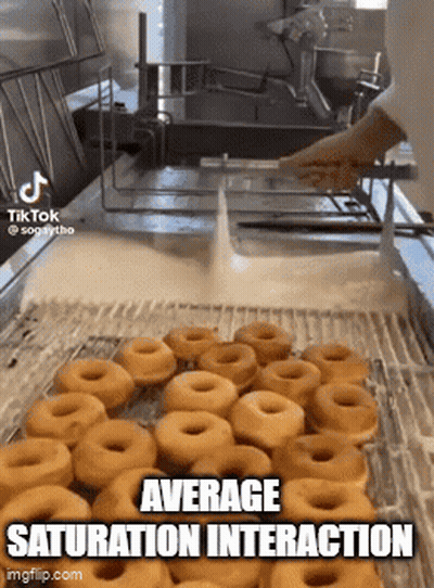 Donuts Being Cooked In Machine GIF