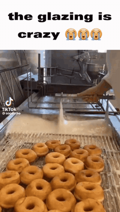 Donuts Being Glazed In Fryer GIF