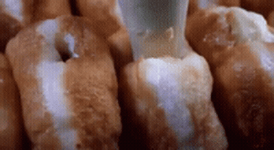 Donuts With Icing Being Poured GIF