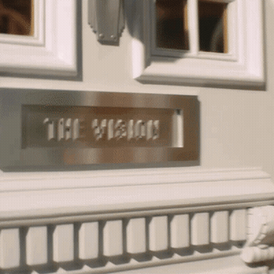 Door Sign Saying The Vision GIF