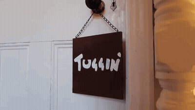 Door Sign Saying Tugging