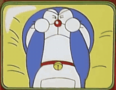 Doraemon Covering Eyes With Paws GIF