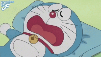 Doraemon Lying On Pillow With Bell GIF