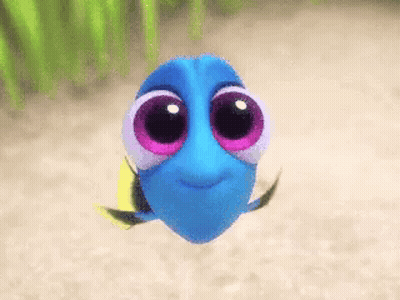 Dory Swimming And Looking At Camera GIF