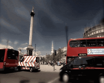 Double Decker Bus With Ambulance Sign GIF