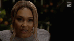 Doubtful Saucy Lady Squinting GIF