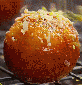 Doughnut Close Up With Nuts GIF