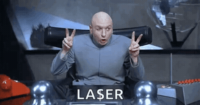 Dr. Evil Giving Peace Sign At Desk With Laser Sign GIF