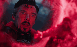 Dr. Strange Looking Into Red Hallow Light GIF