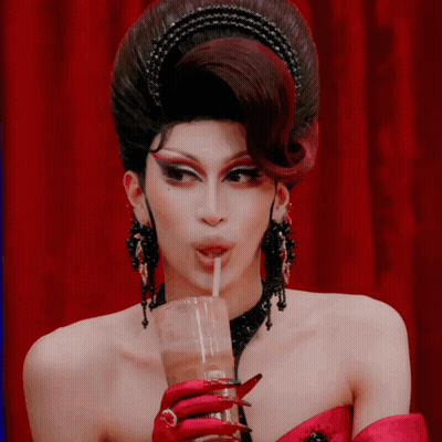 Drag Queen Drinking Through Straw GIF