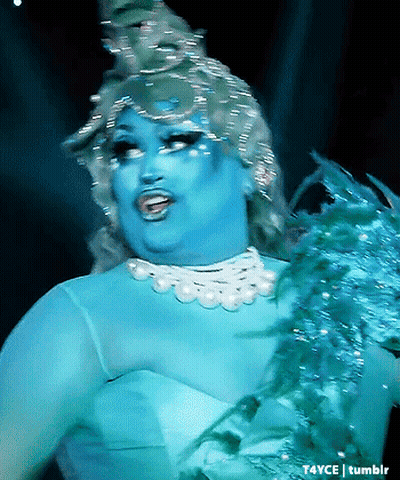 Drag Queen In Blue Dress And Pearls GIF