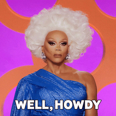 Drag Queen In Blue Dress And White Wig Saying Well Howdy GIF