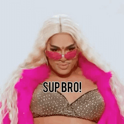 Drag Queen In Pink Fur Coat And Sunglasses Says Sup Bro GIF