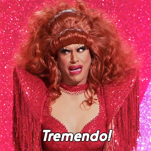 Drag Queen In Red Dress Saying Tremendo GIF