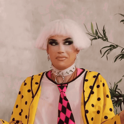 Drag Queen In Yellow And Pink Polka Dot Jacket GIF
