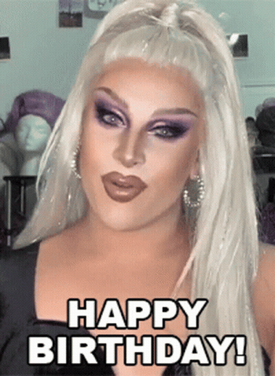 Drag Queen Saying Happy Birthday In Front Of Mannequin GIF