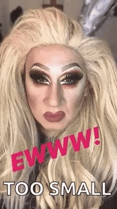 Drag Queen With Blonde Hair And Red Lips GIF