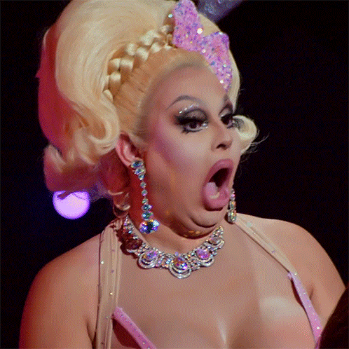 Drag Queen With Necklace And Earrings Surprised Face GIF