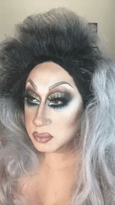 Drag Queen With Nose Ring And Wig GIF