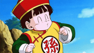 Dragon Ball Z Character In Yellow Shirt With Chinese Characters GIF