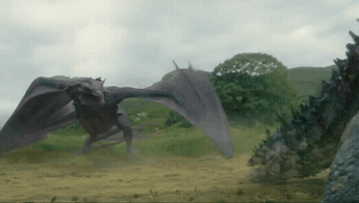 Dragon Flying Over Grassy Field GIF
