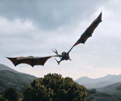 Dragon Flying Over Tree Through Cloudy Sky GIF