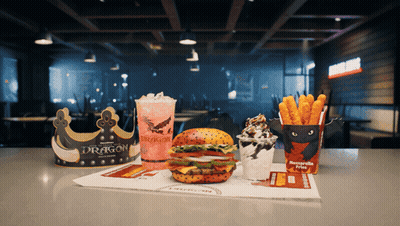 Dragon Word On Cup Next To Burger GIF