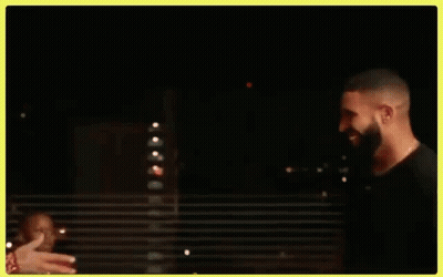 Drake And Chris Brown Are Shaking Hands In A Dark Room . GIF