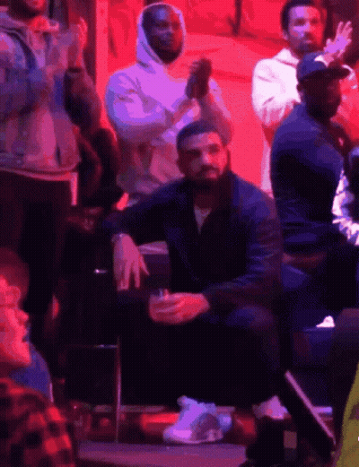 Drake Sitting In Stands With Drink GIF