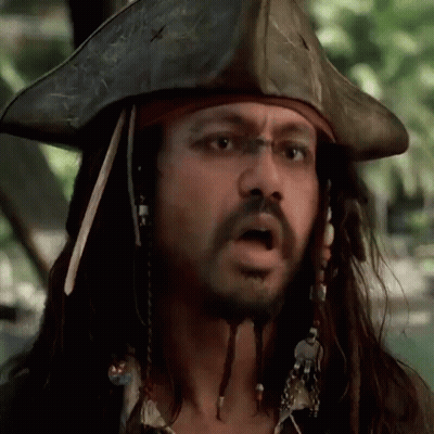 Dreadlocked Man In Pirate Hat Making Funny Face GIF