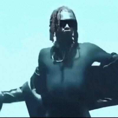 Dreadlocked Man In Sunglasses And Black Jacket GIF