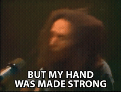 Dreadlocked Man Says But My Hand Was Made Strong GIF