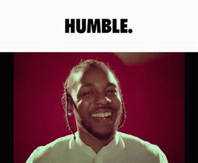 Dreadlocked Man Smiling Humble Red Background GIF