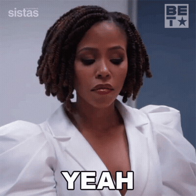 Dreadlocked Woman Saying Yeah In White Shirt GIF