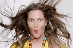 Drew Barrymore Blowing GIF