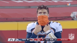 Drew Lock With Handkerchief Covering His Mouth GIF