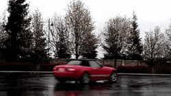 Drift Cars On A Wet Road GIF