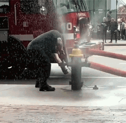 Drinking From A Fire Hose Fireman Fail GIF