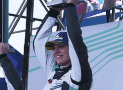 Driving Fast Car Racer Holding Winning Trophy  GIF